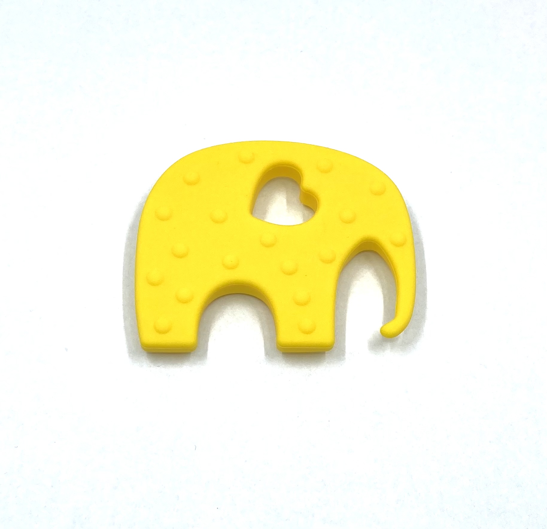 Silikonové kousátko slon tmavě žlutý 80 mm